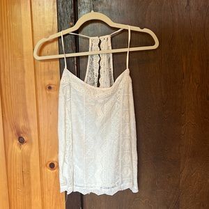White Pookie and Sebastian tank top. Size S